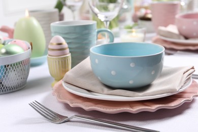 Festive table setting with elegant dishware, closeup. Easter celebration