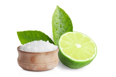 Image of Cut lime and salt isolated on white. Margarita cocktail ingredients