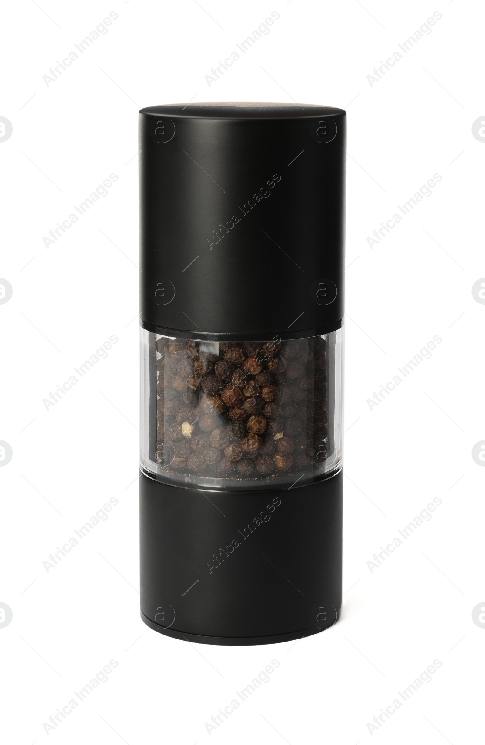 Photo of Pepper shaker isolated on white. Spice mill