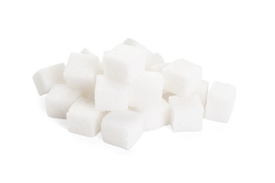 Photo of Pile of sugar cubes isolated on white