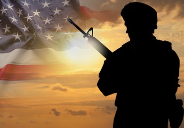 Image of Veterans Day. Silhouette of military man on sunset outdoors and flag of USA, double exposure