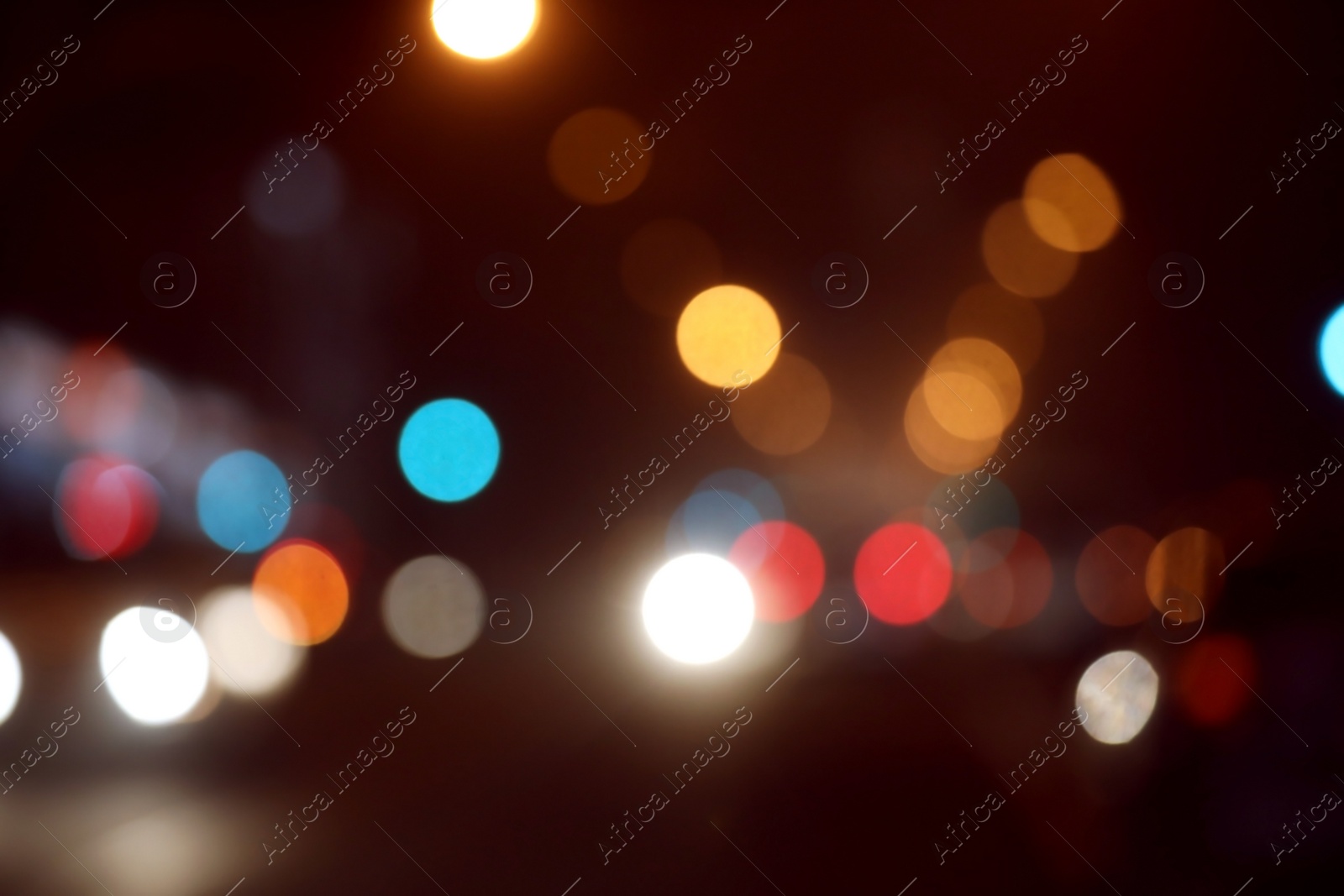 Photo of Blurred view of night city. Bokeh effect