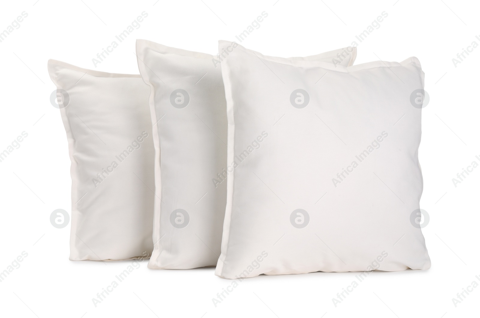 Photo of Many new soft pillows isolated on white