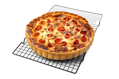 Delicious homemade quiche with prosciutto and tomatoes isolated on white