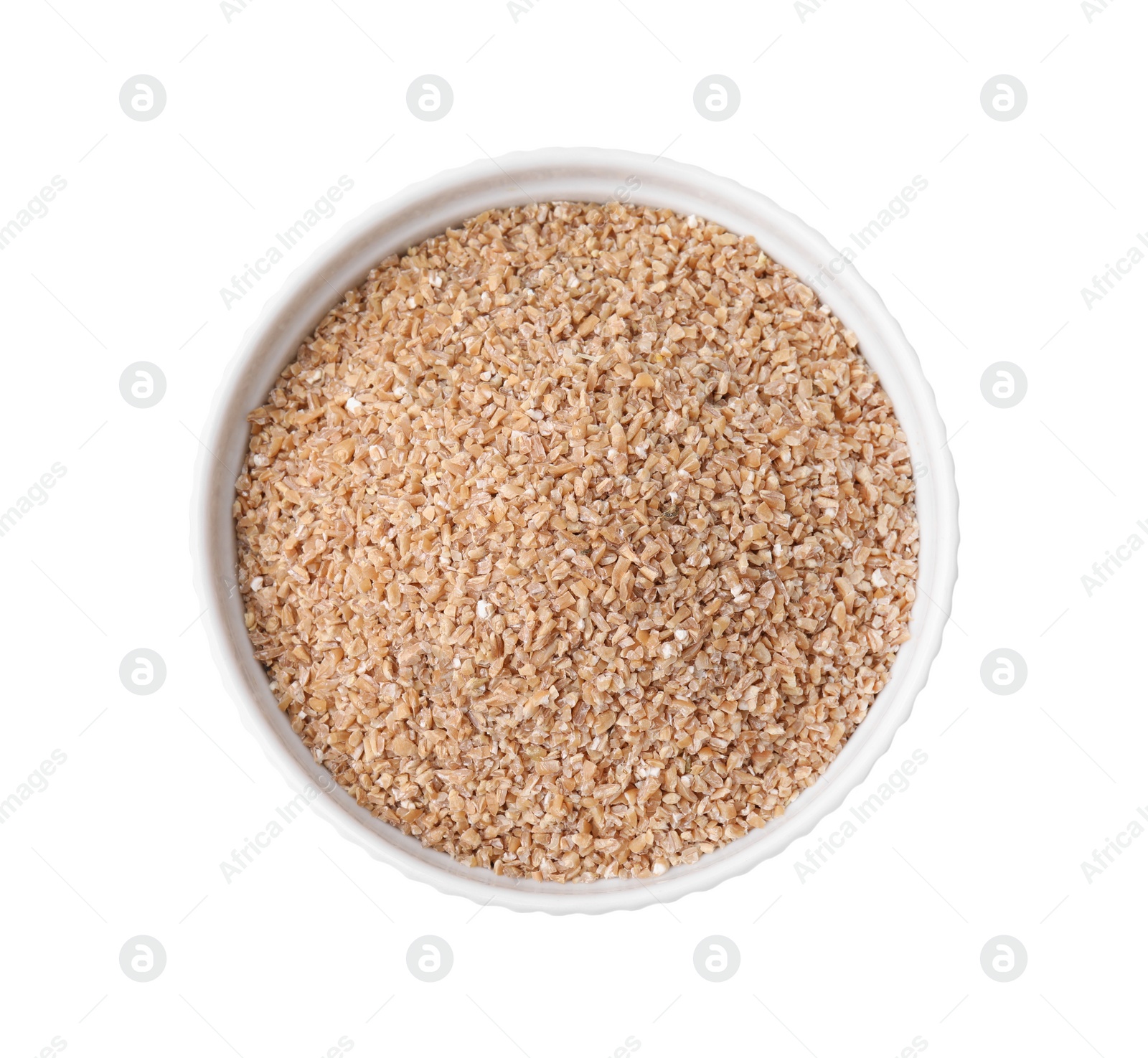 Photo of Dry wheat groats in bowl isolated on white, top view