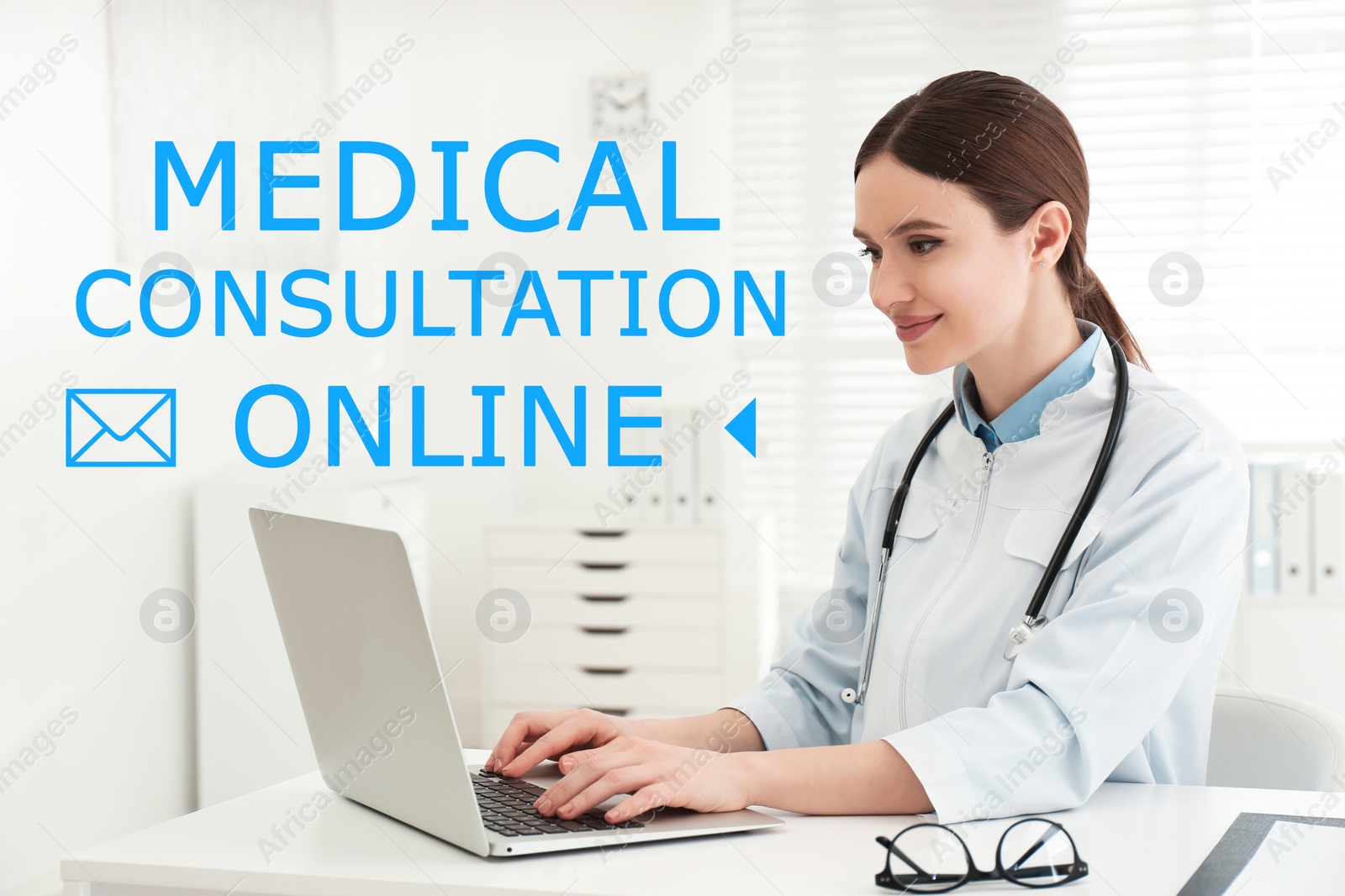 Image of Doctor using laptop at workplace. Medical Consultation Online