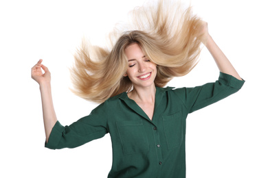 Portrait of beautiful young woman with blonde hair on white background