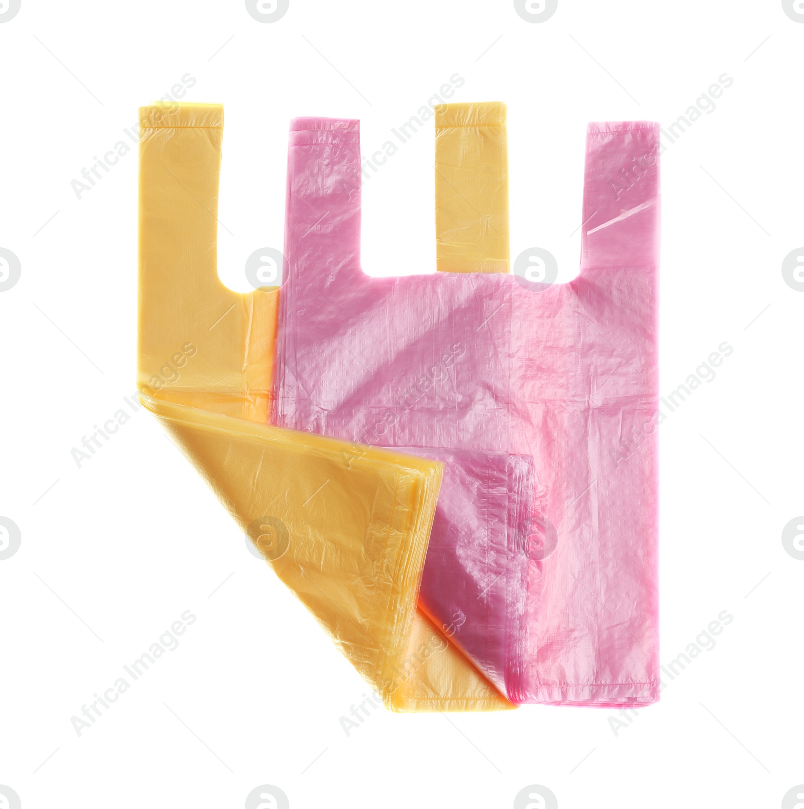 Photo of Stack of plastic bags isolated on white, top view