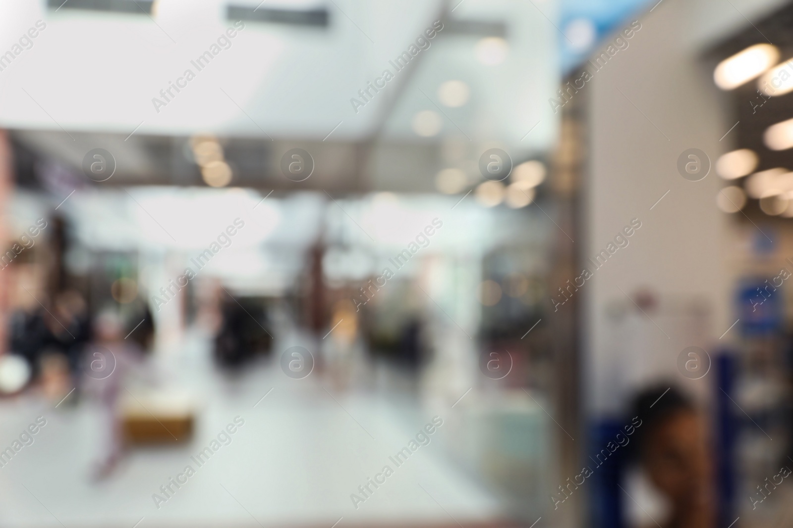 Photo of Blurred view of shopping mall interior. Bokeh effect