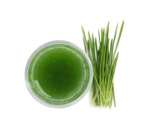 Photo of Glass of fresh wheat grass juice and sprouts on white background, top view