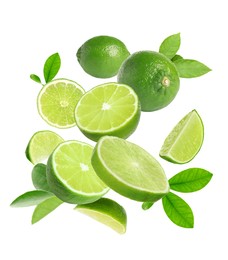 Image of Fresh lime fruits and green leaves falling on white background