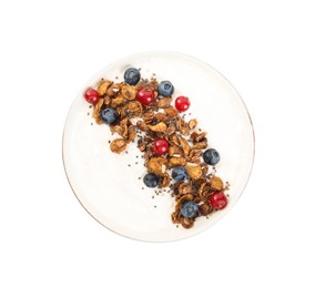 Photo of Delicious yogurt with granola and berries in bowl isolated on white, top view