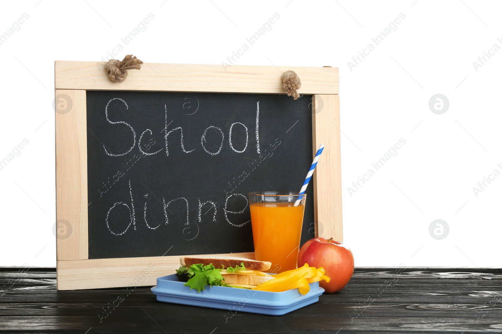 Photo of Composition with lunch box and food on table against white background