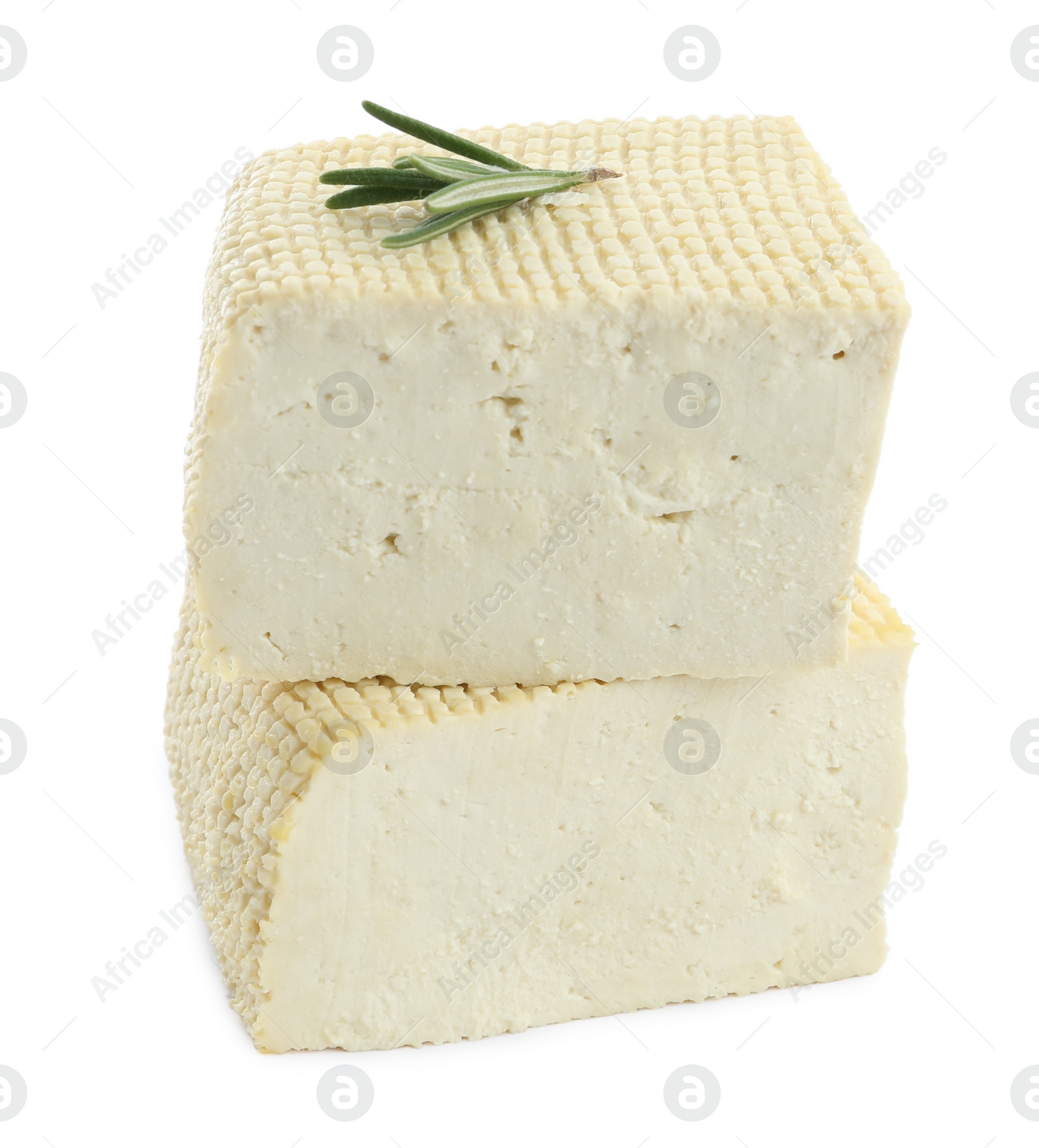 Photo of Pieces of delicious tofu and rosemary on white background. Soybean curd