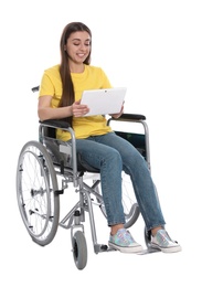Photo of Young woman in wheelchair using tablet isolated on white