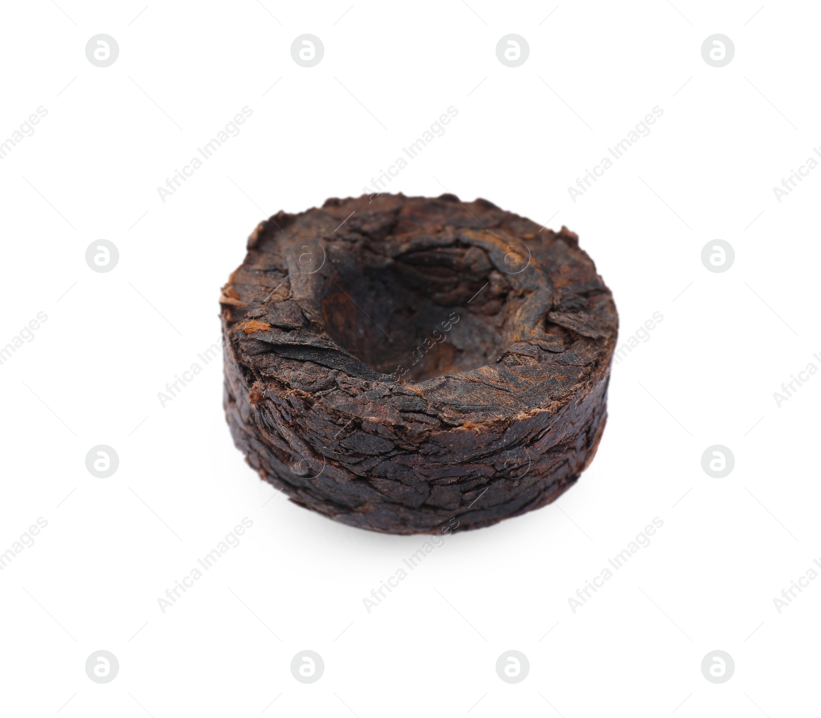 Photo of Cake shaped traditional Chinese pu-erh tea isolated on white