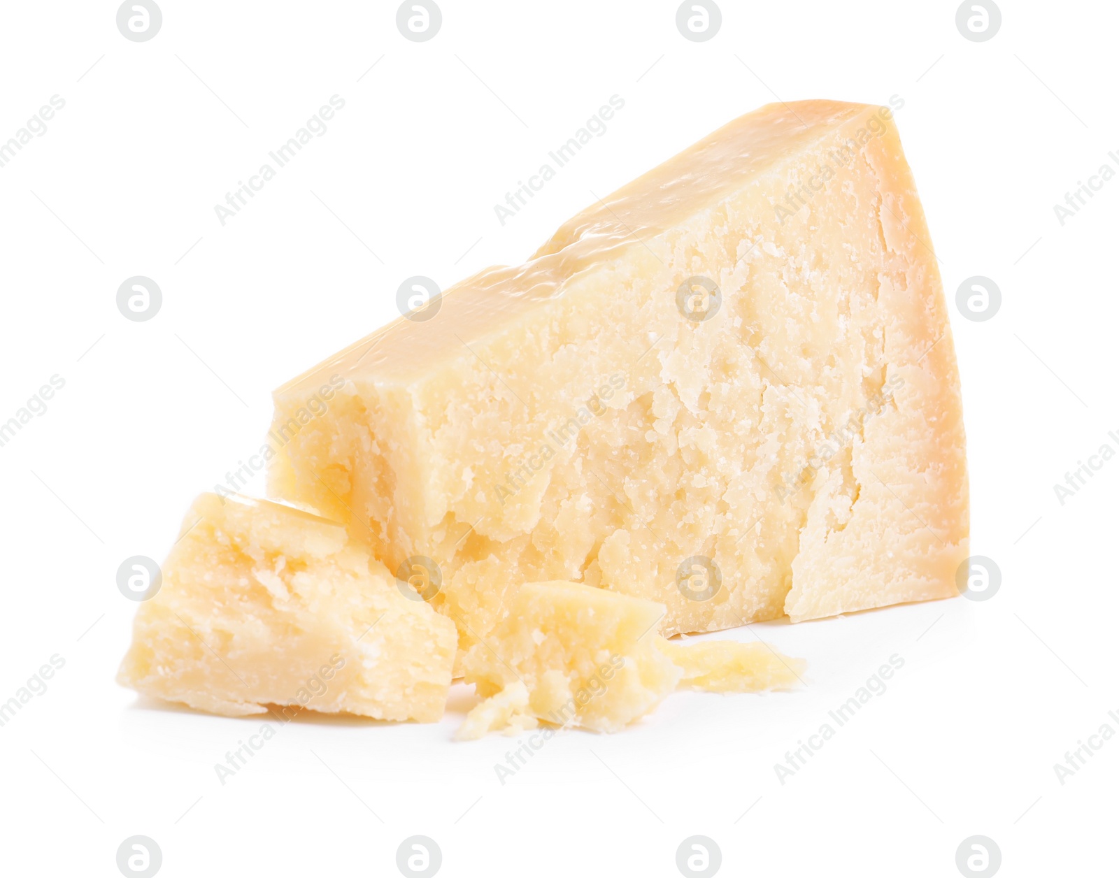 Photo of Pieces of delicious parmesan cheese on white background