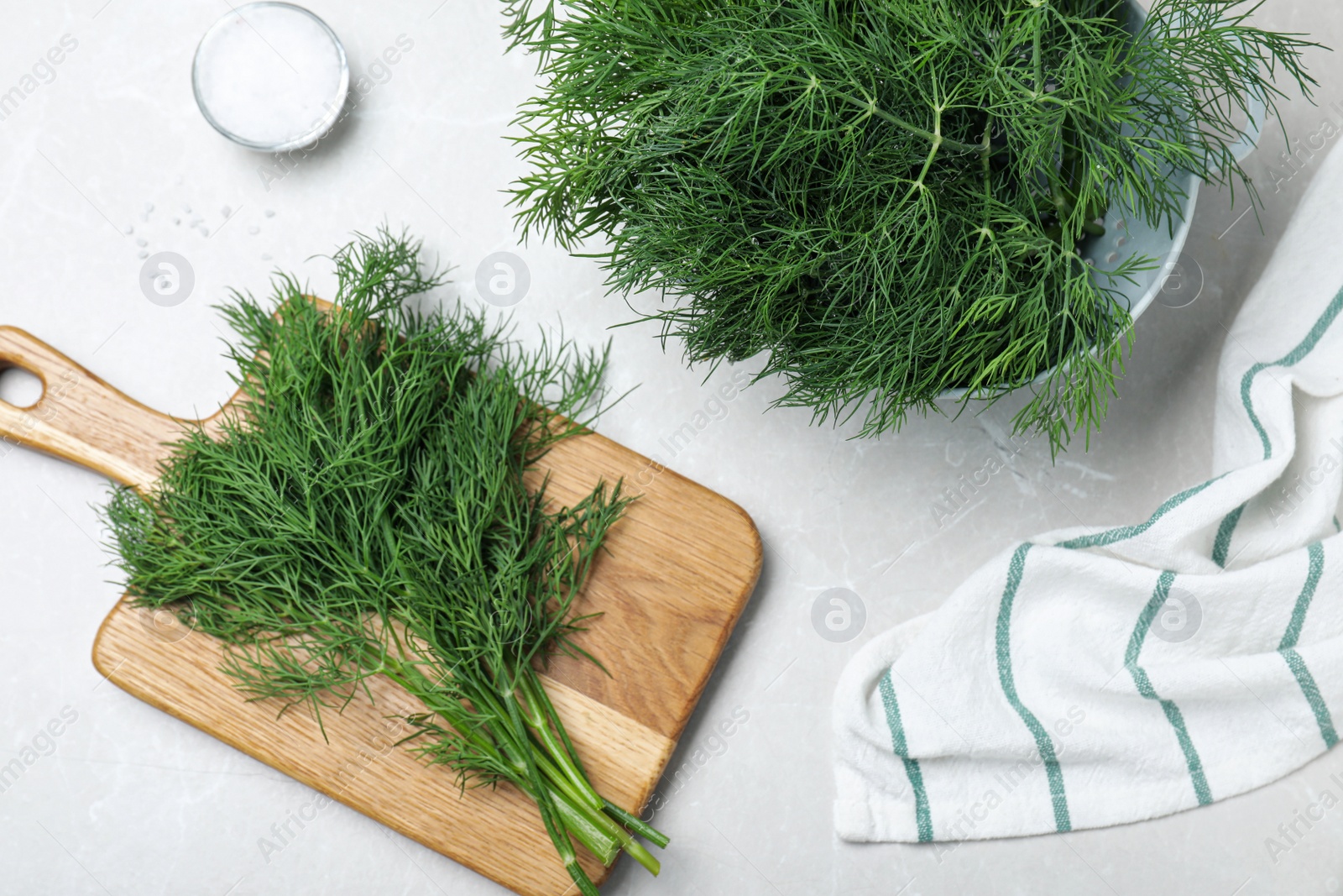 Photo of Flat lay composition with fresh dill on light table