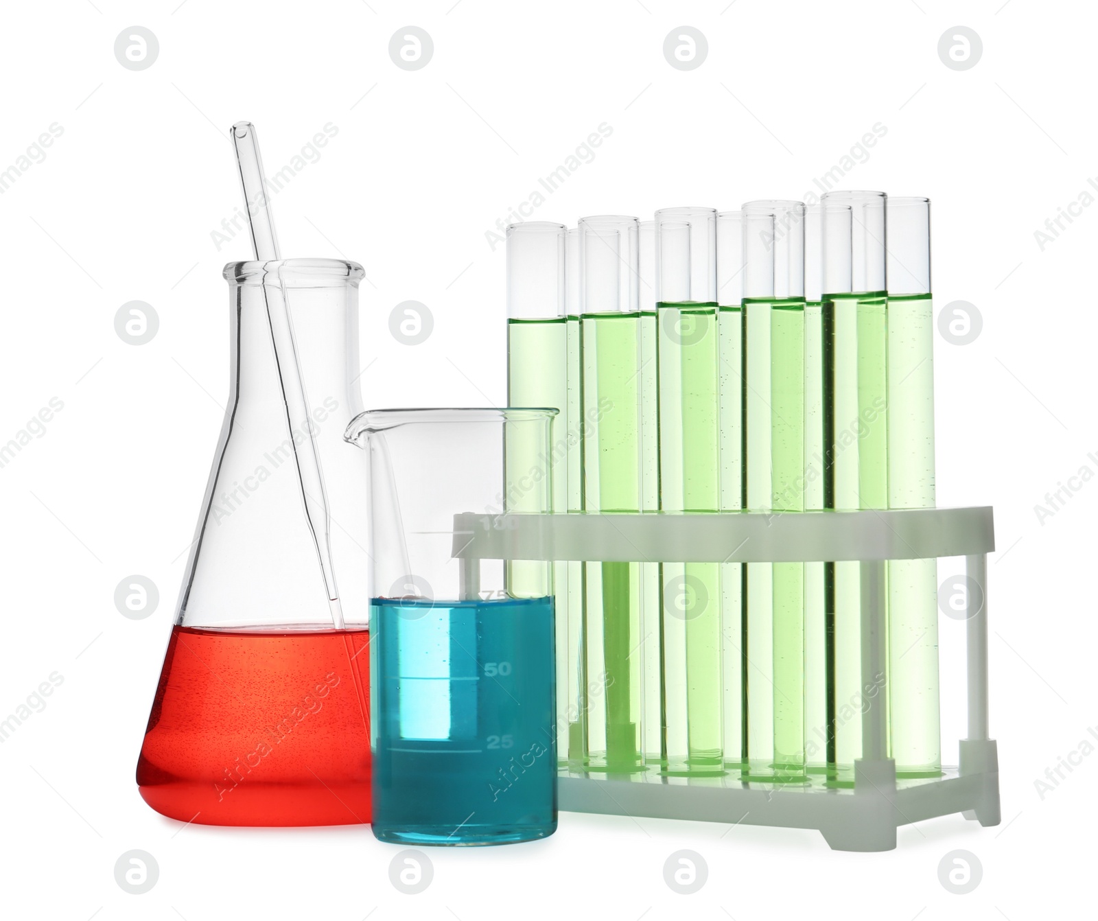 Photo of Different laboratory glassware with color liquid isolated on white