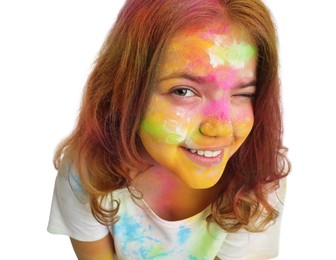 Photo of Teen girl covered with colorful powder dyes on white background. Holi festival celebration