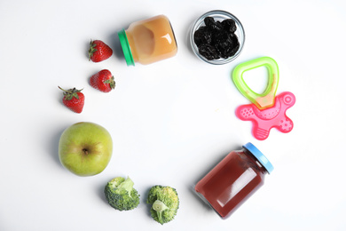 Photo of Frame of healthy baby food and ingredients on white background, flat lay. Space for text