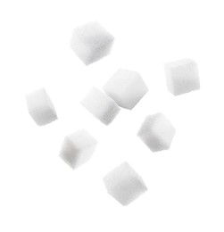 Refined sugar cubes in air on white background