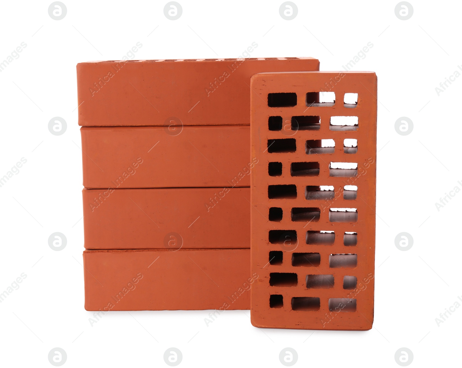 Photo of Many red bricks on white background. Building material