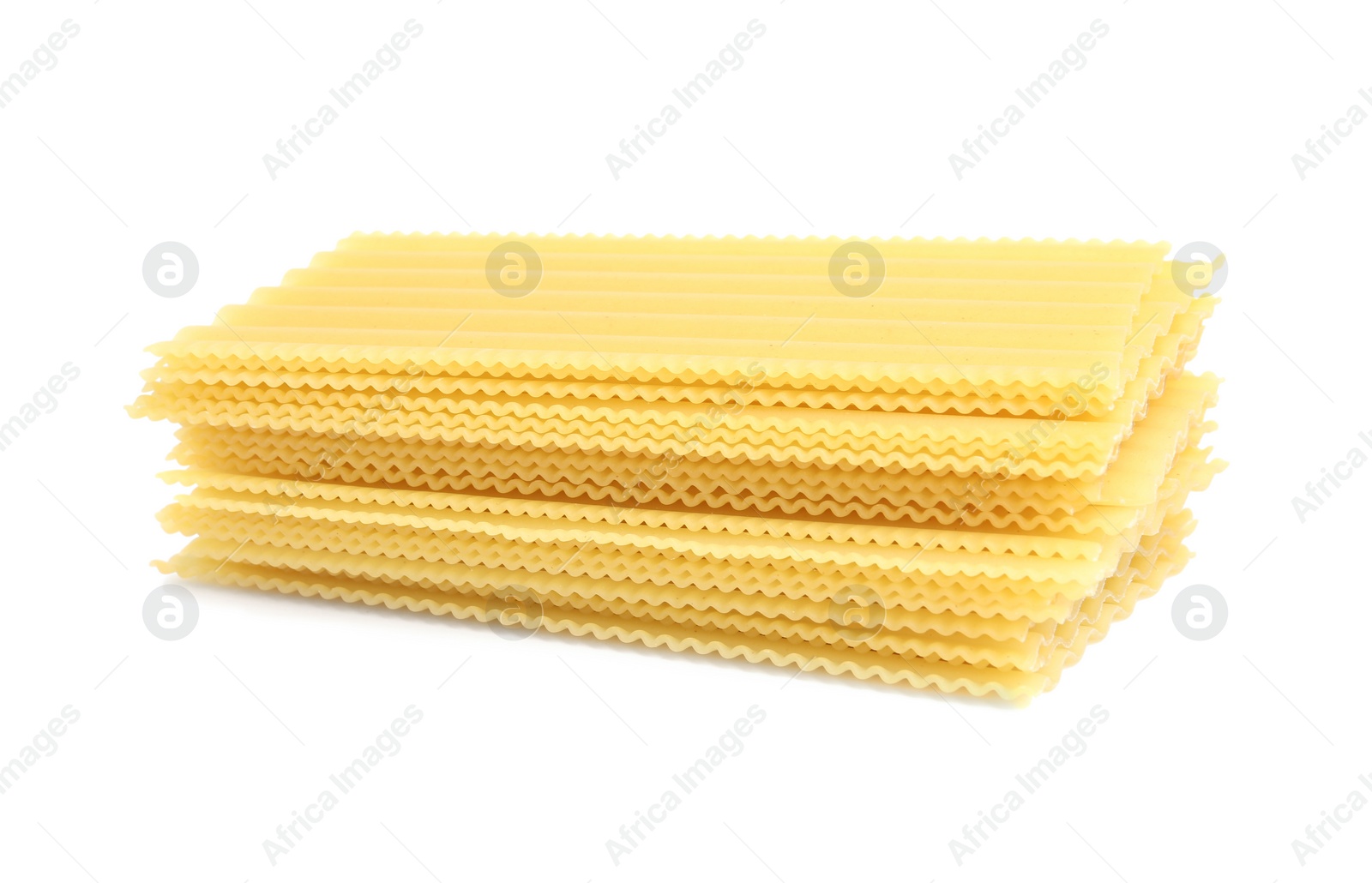 Photo of Stack of uncooked lasagna sheets isolated on white