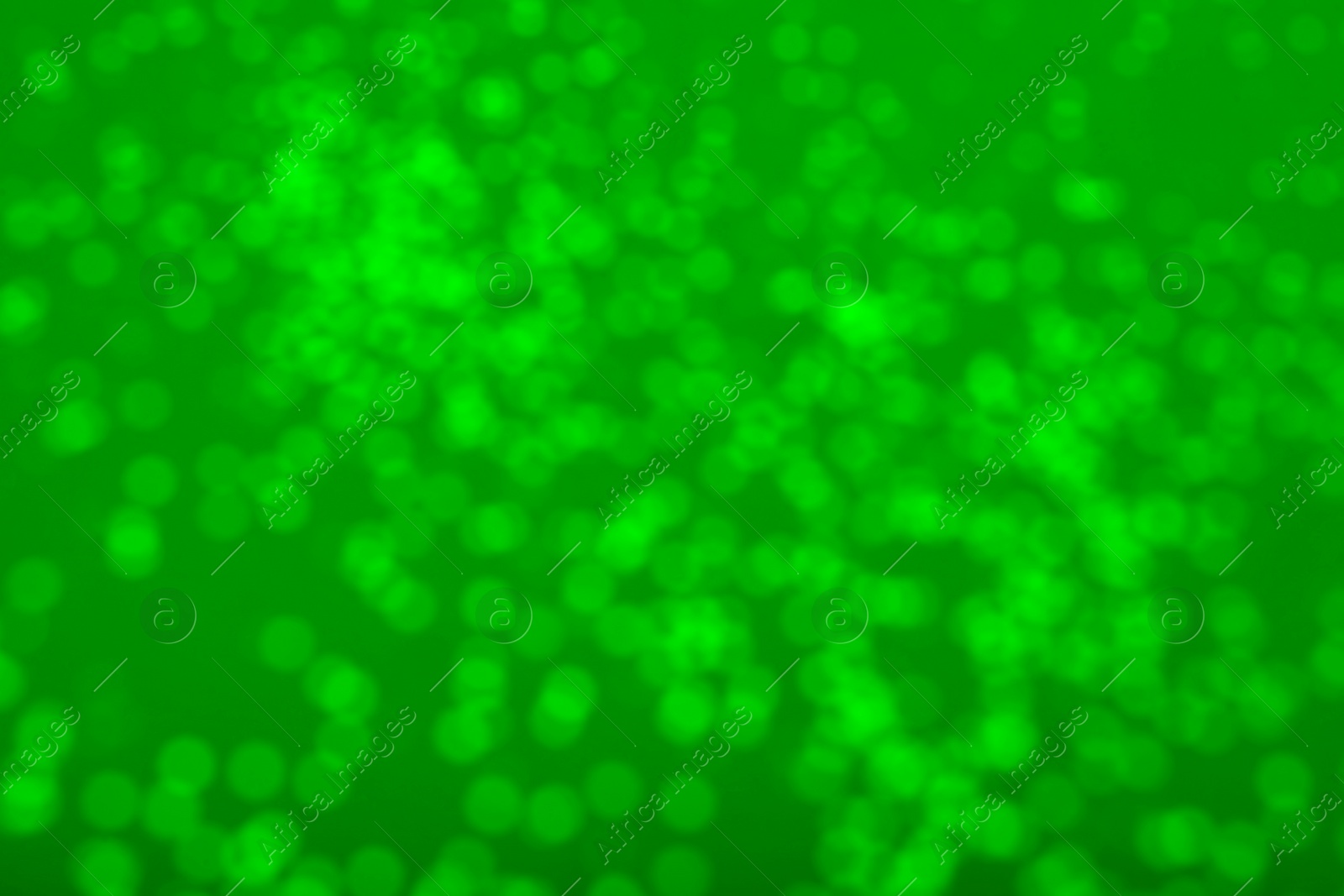 Image of St. Patrick day. Green background with blurred lights, bokeh effect