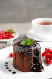 Delicious warm chocolate lava cake on plate