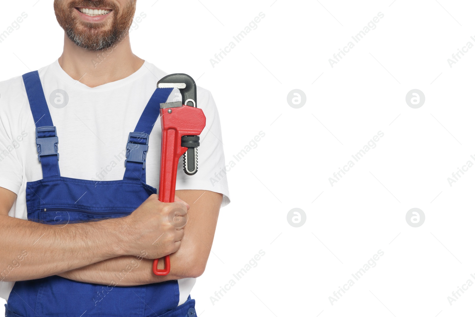 Photo of Professional plumber with pipe wrench and on white background, closeup