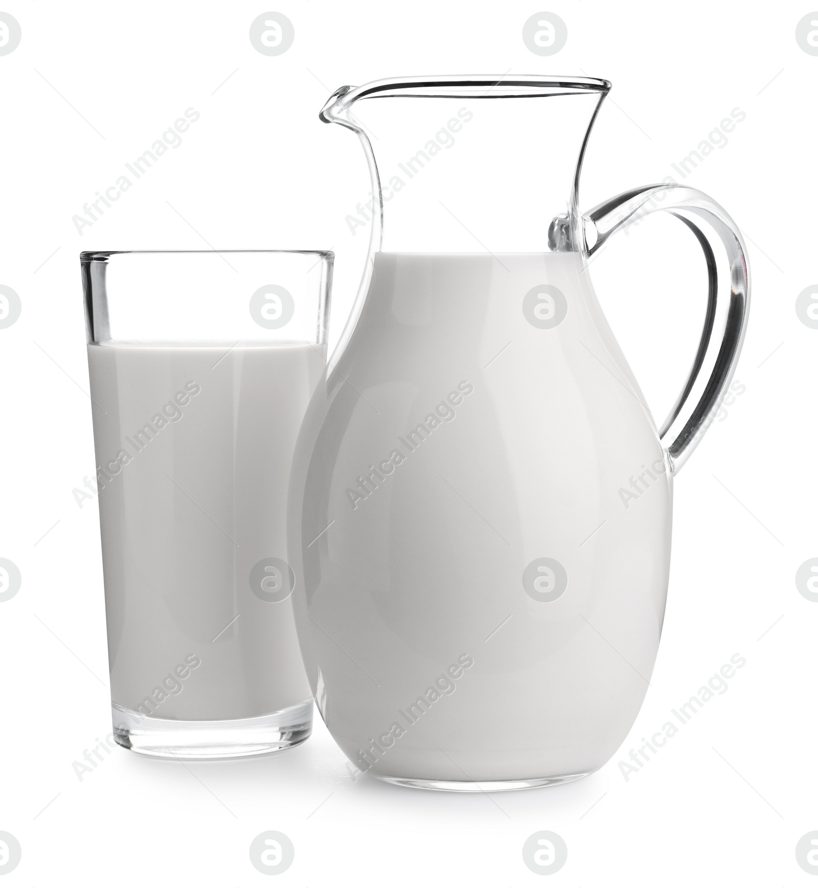 Photo of Jug and glass with fresh milk on white background