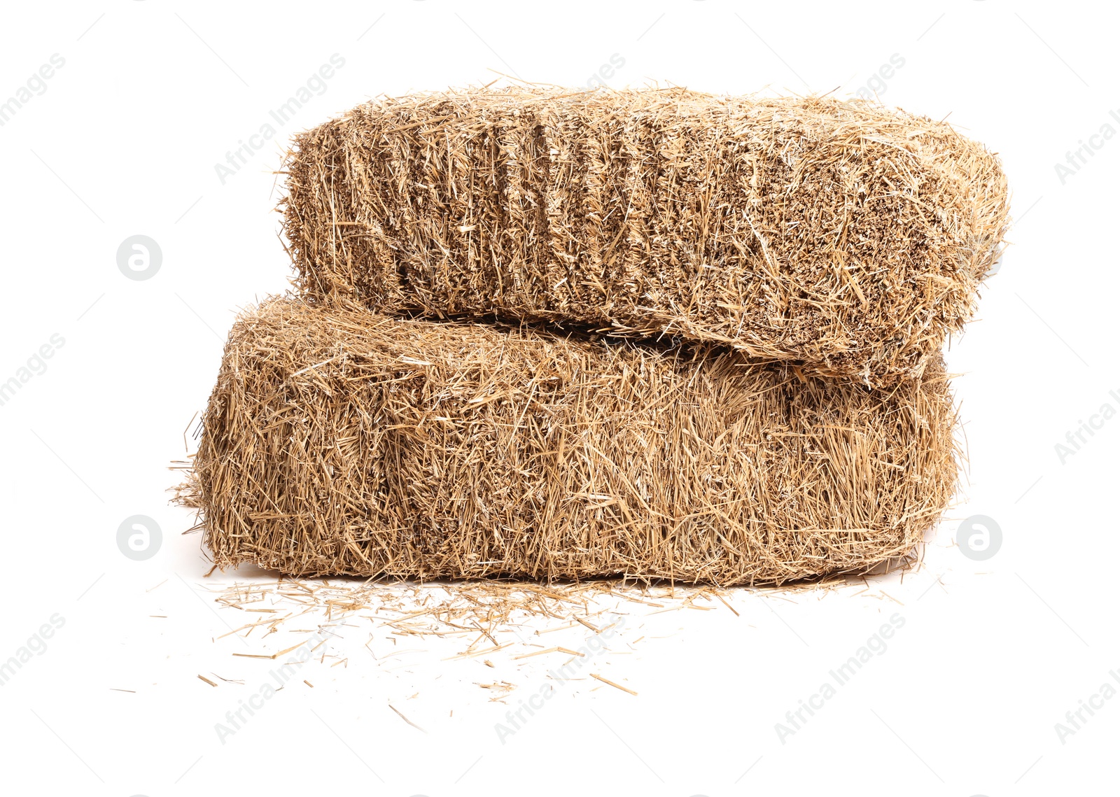 Photo of Bales of dried straw isolated on white