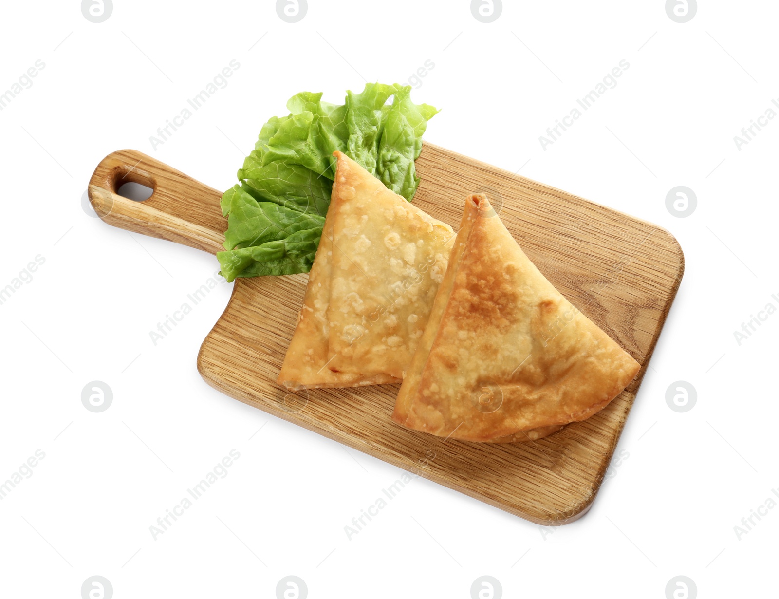 Photo of Fresh delicious crispy samosas and lettuce on white background, above view