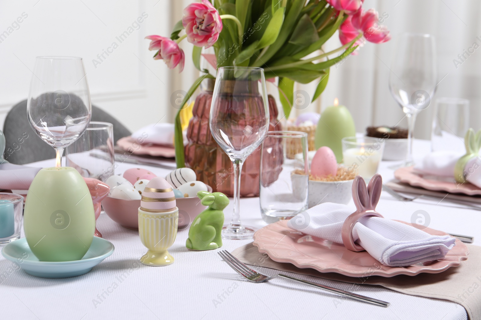 Photo of Festive table setting with beautiful flowers. Easter celebration