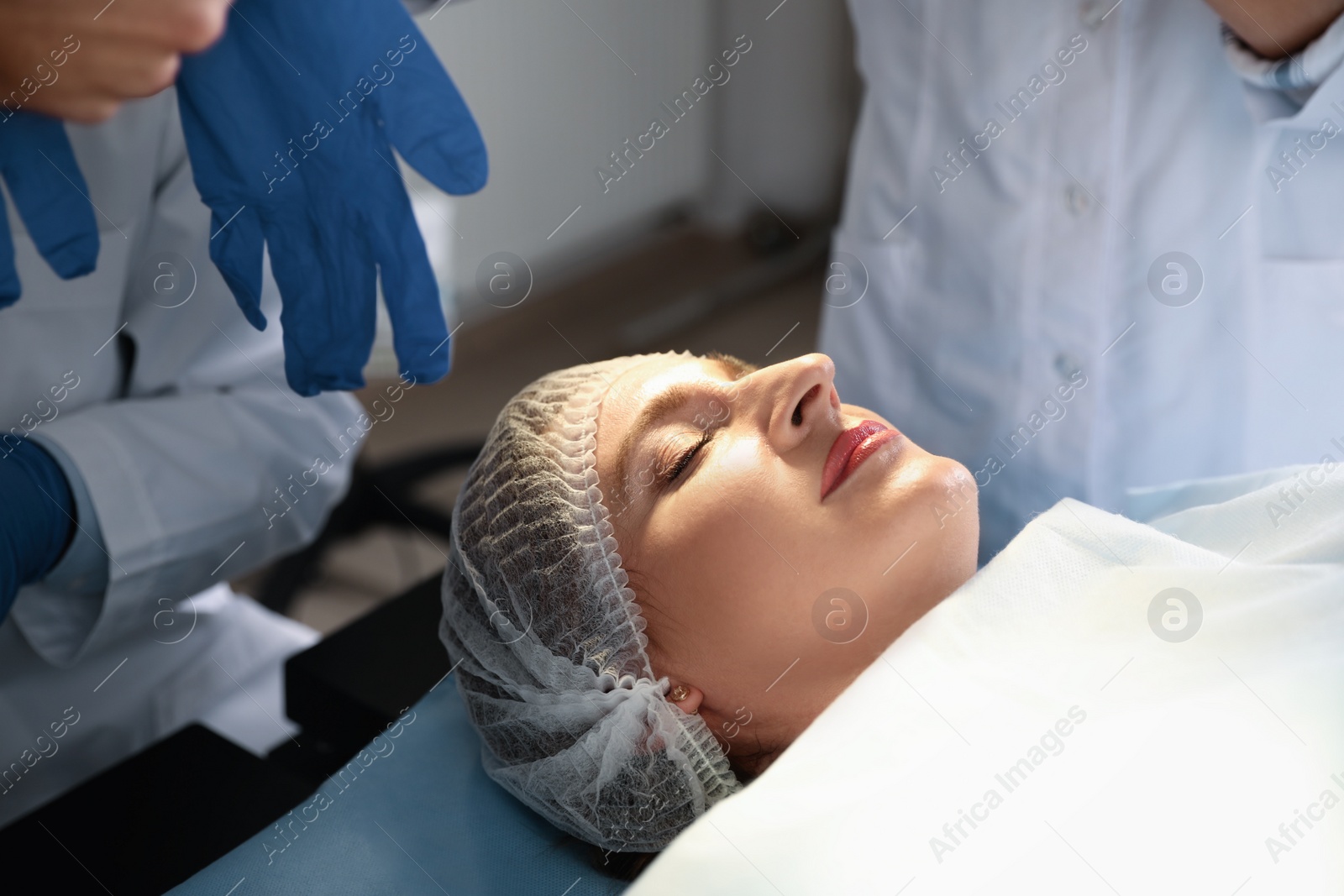 Photo of Female patient on bed in surgery room