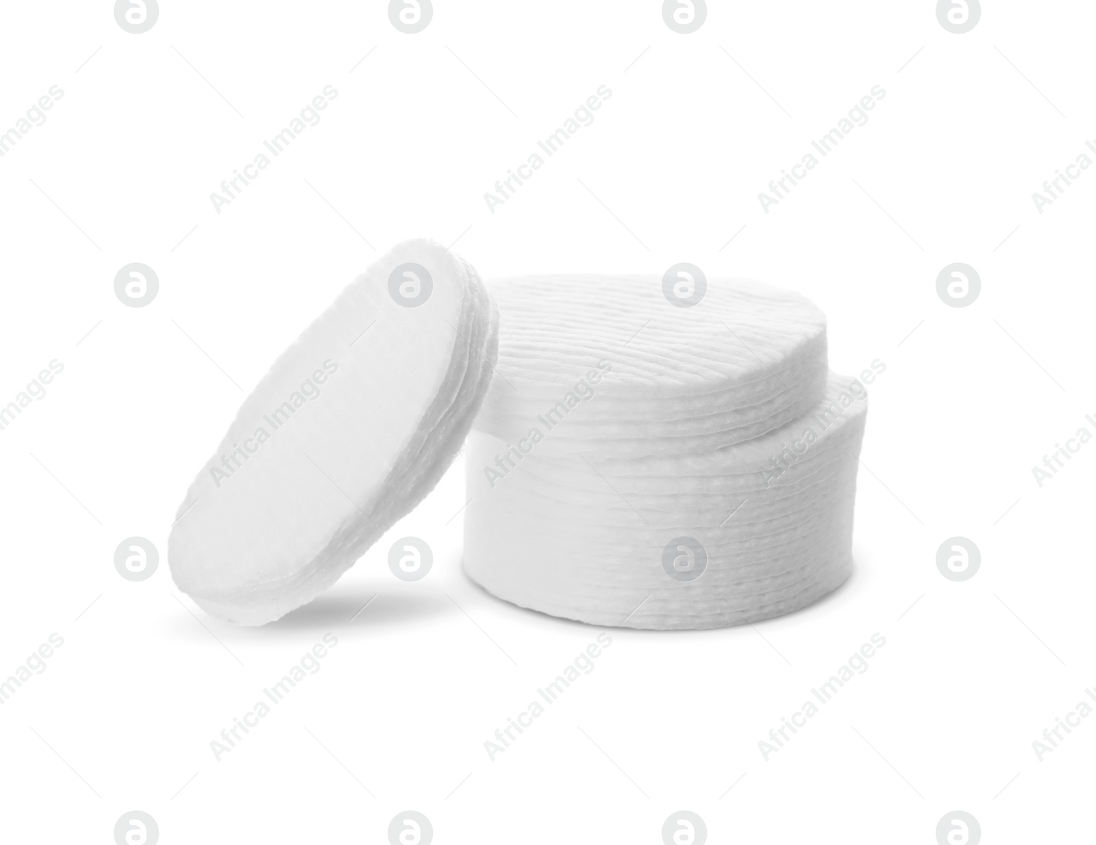 Photo of Pile of cotton pads on white background