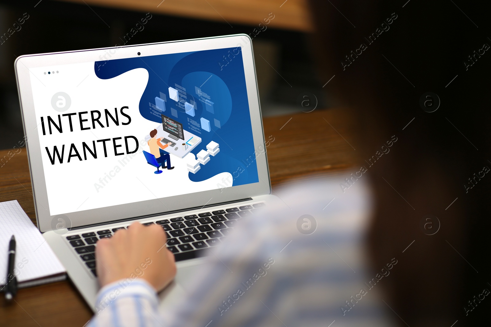 Image of Woman with laptop at wooden table, closeup. Interns wanted