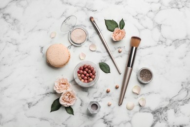 Photo of Flat lay composition with makeup products, roses and macaron on white marble background