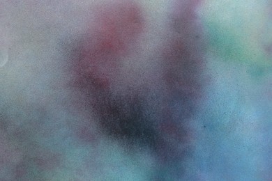 Photo of Texture of abstract spray paint as background, top view