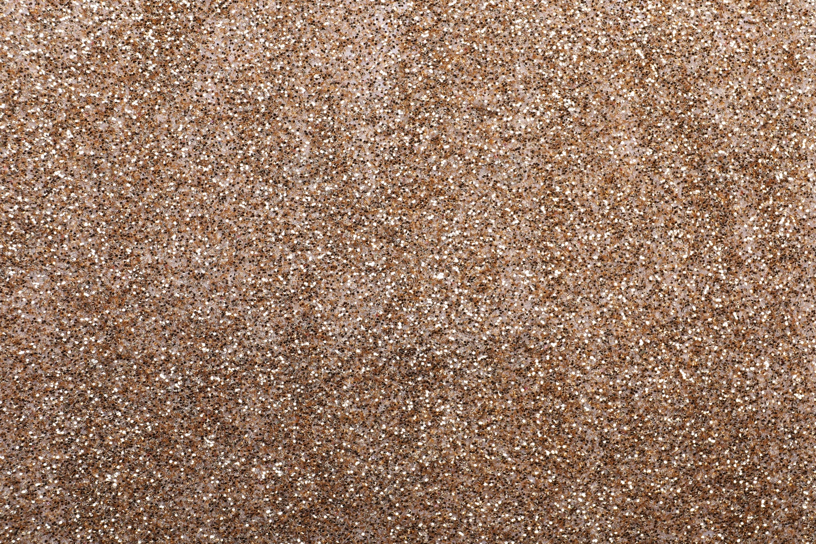 Photo of Shiny light brown glitter as background, closeup