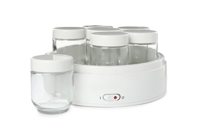 Modern yogurt maker with empty jars on white background