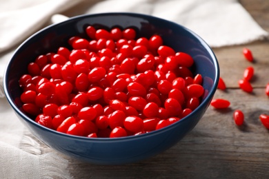 Photo of Fresh ripe goji berries on wooden table