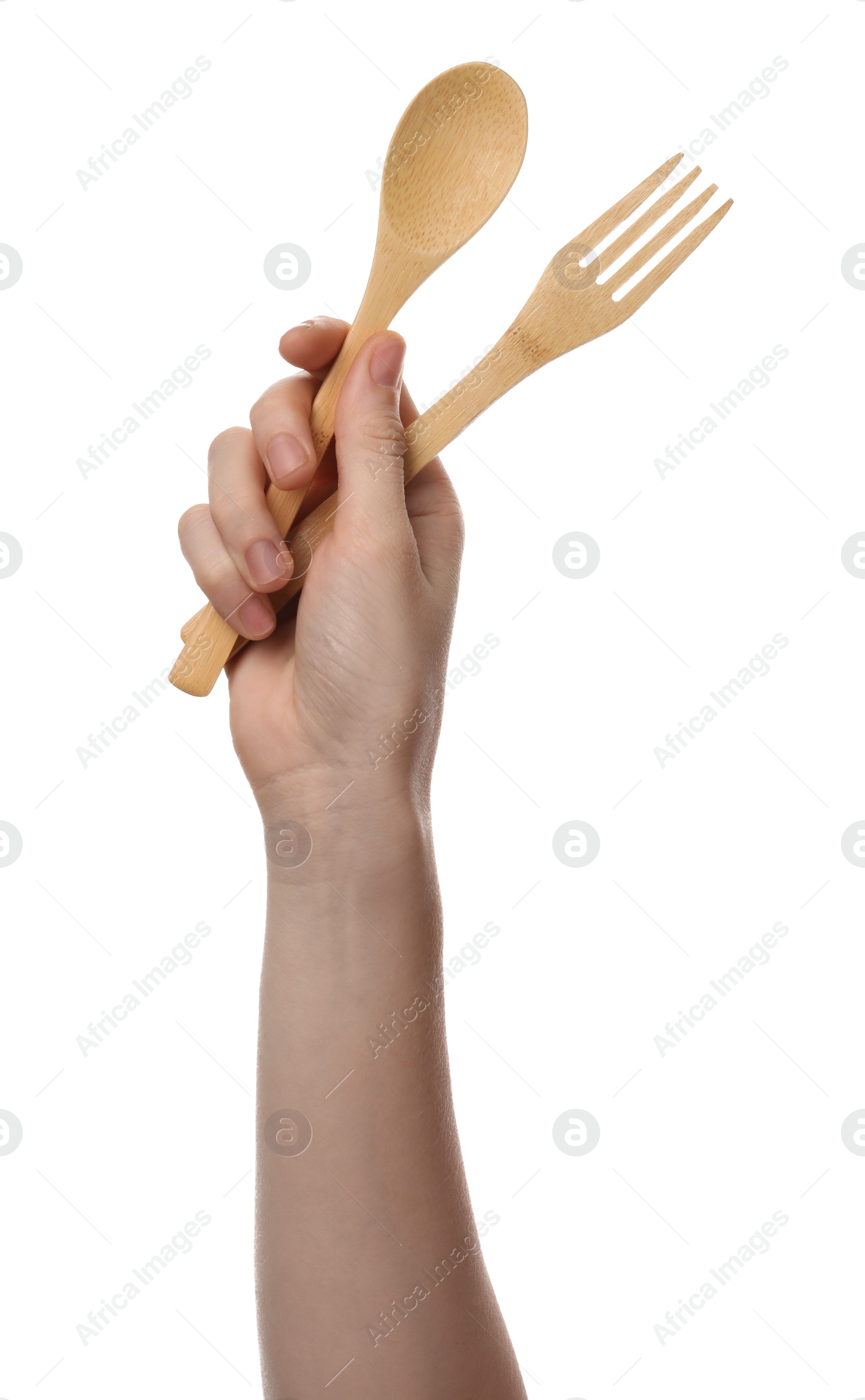 Photo of Woman holding eco friendly cutlery on white background, closeup. Conscious consumption