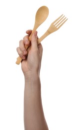 Woman holding eco friendly cutlery on white background, closeup. Conscious consumption