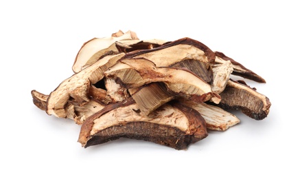 Slices of dried mushrooms on white background