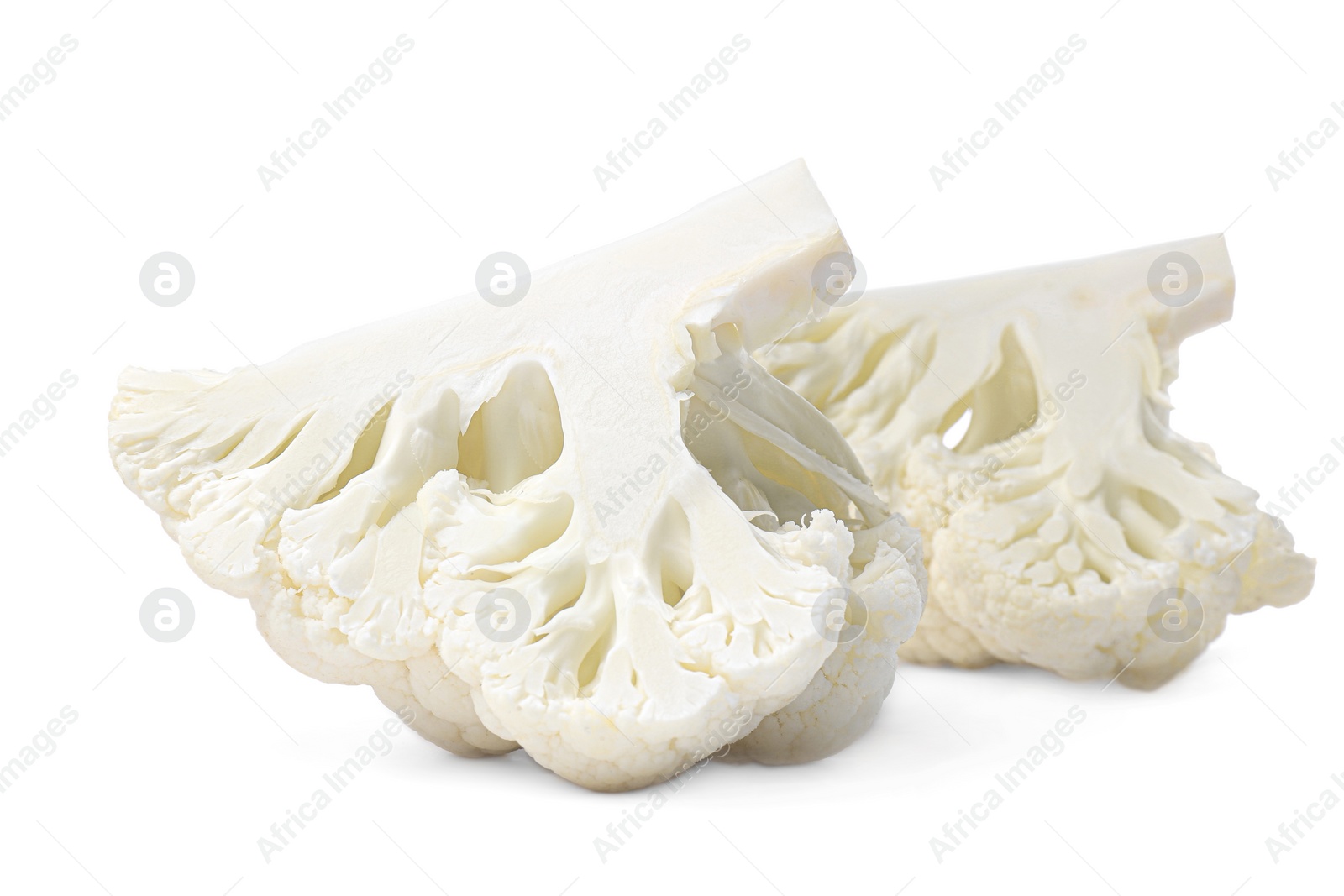 Photo of Cut fresh raw cauliflowers on white background