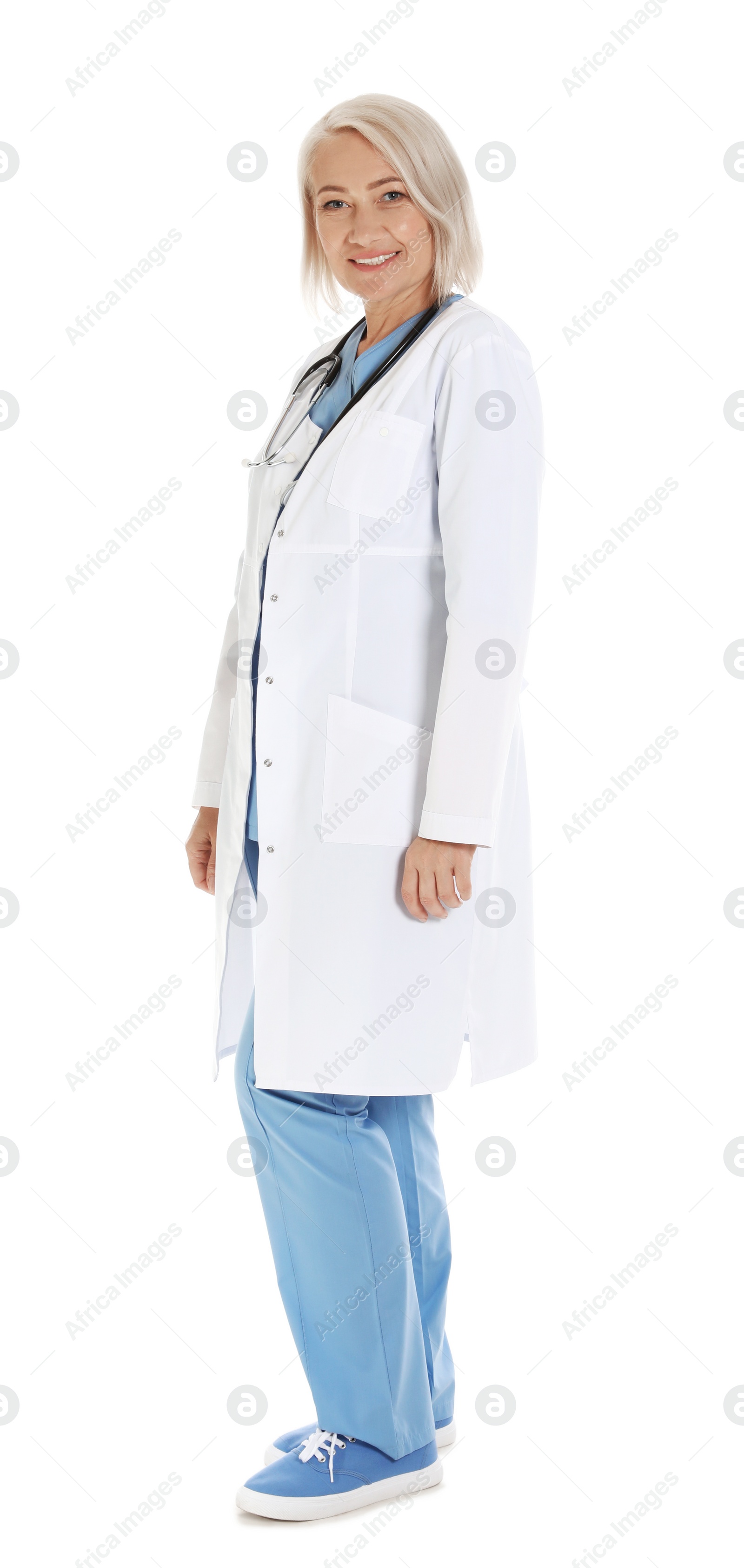 Photo of Full length portrait of female doctor isolated on white. Medical staff