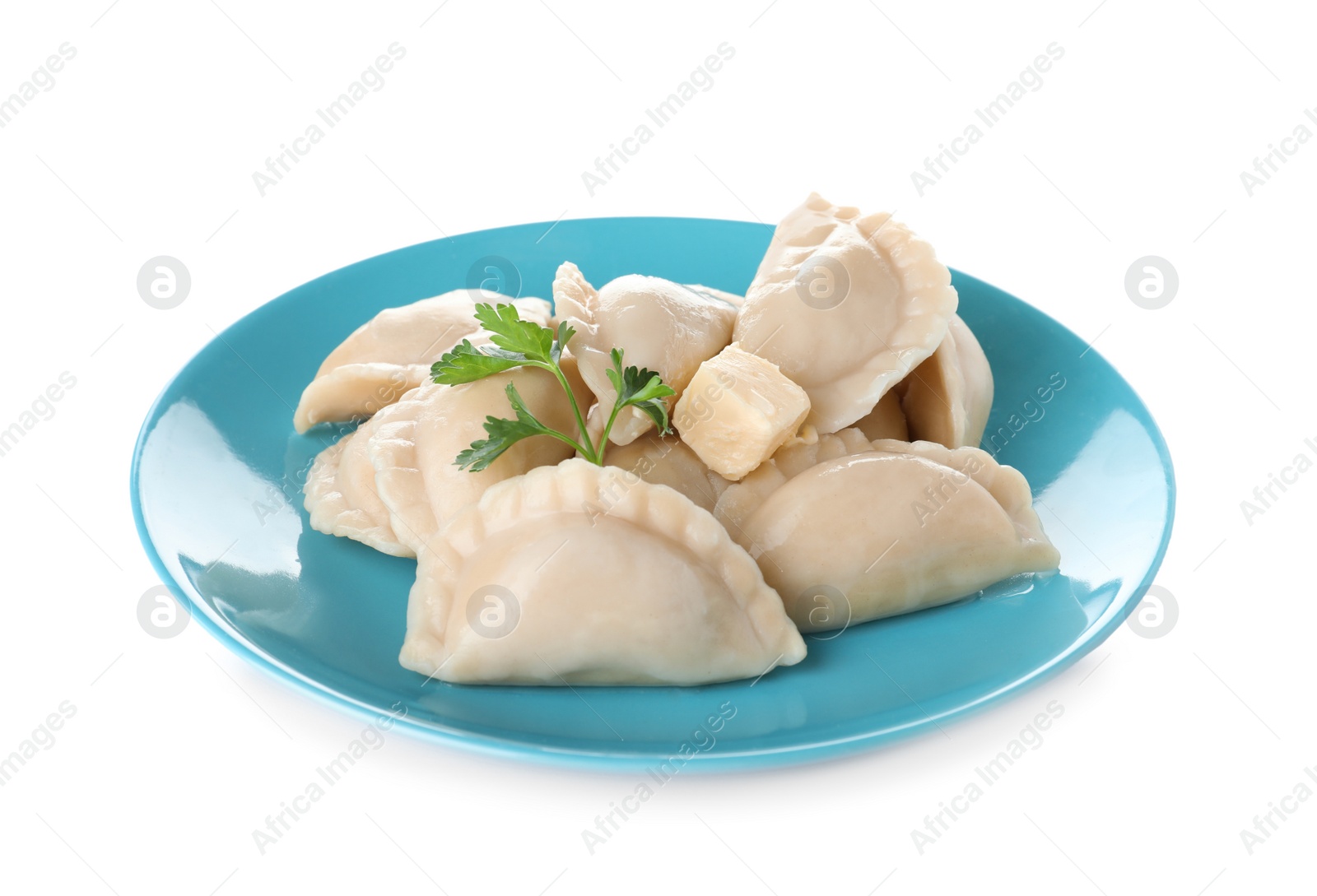 Photo of Plate of tasty dumplings served with parsley and butter on white background