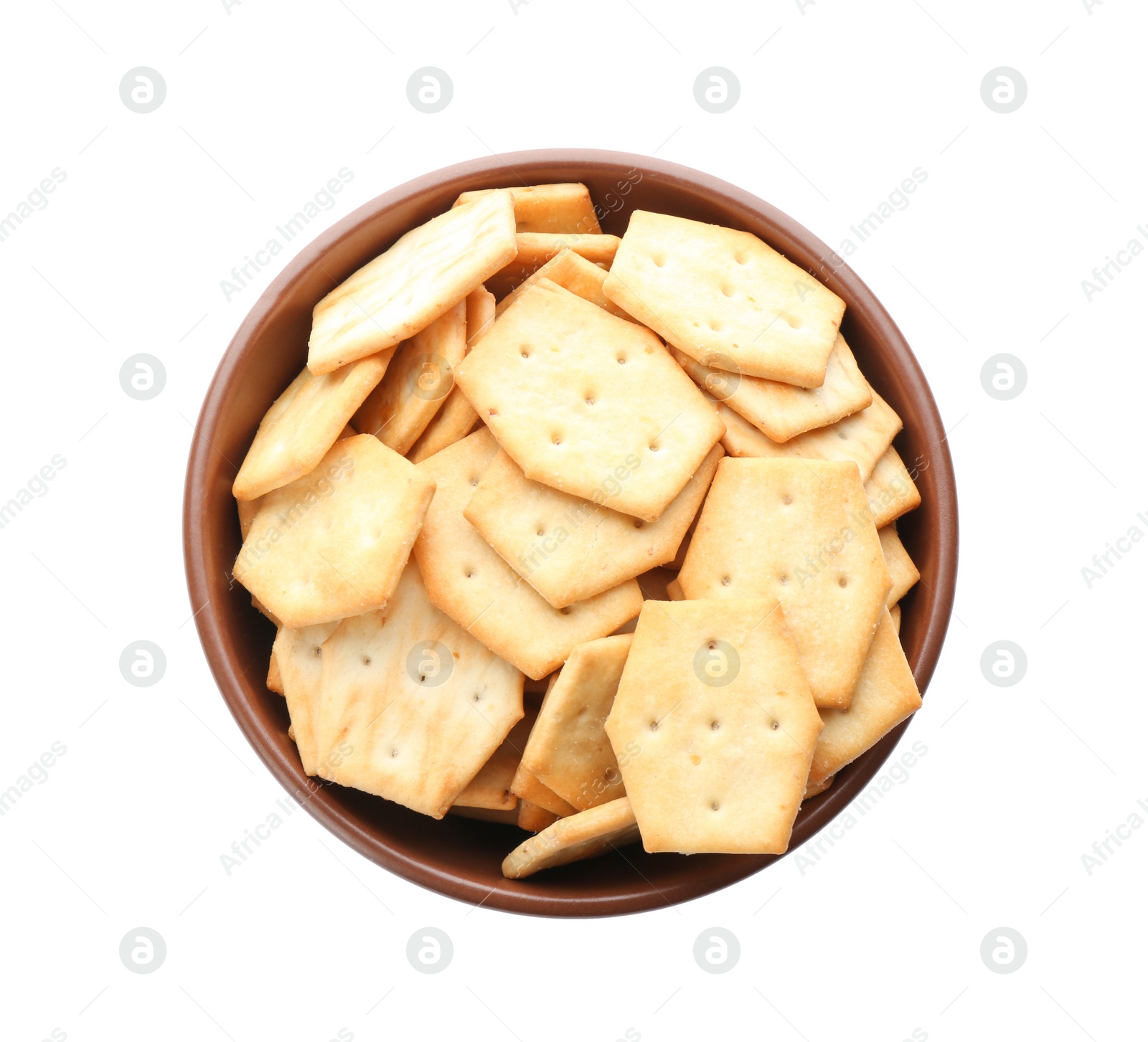 Photo of Delicious crackers in bowl isolated on white, top view